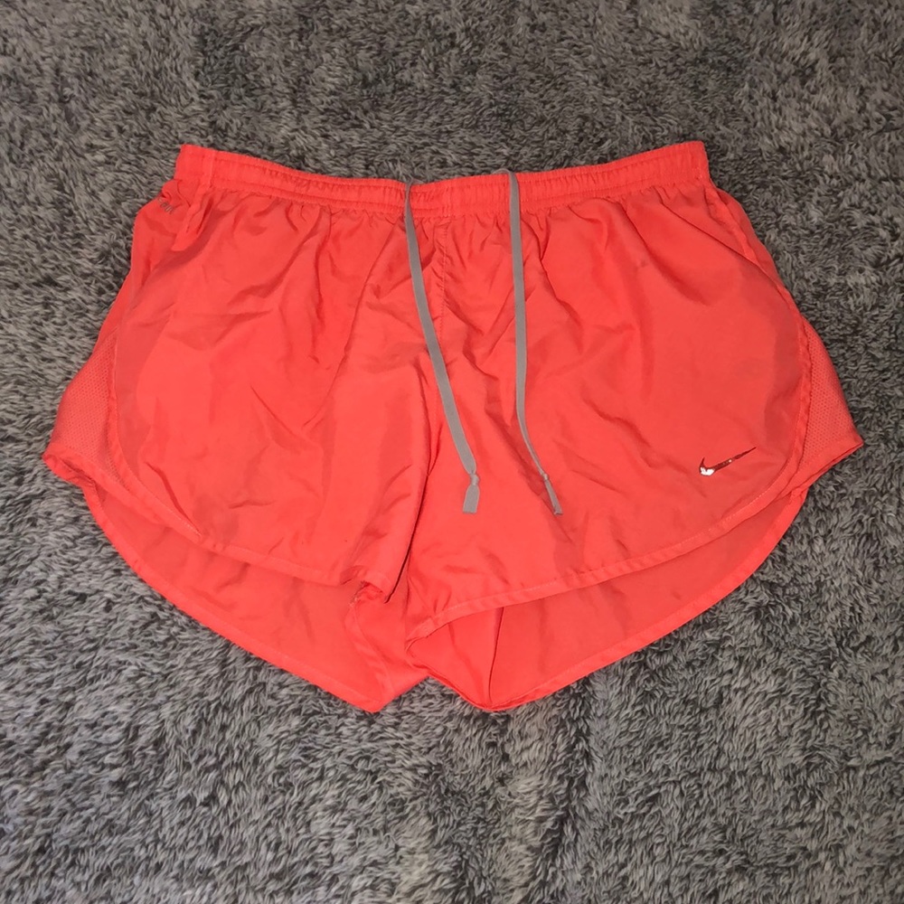 coral color nike shorts